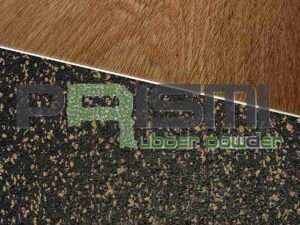 Photo of PRISMI MGC rubber-cork underlay installed under parquet flooring for impact sound insulation. Image of acoustic underlay installed under parquet
