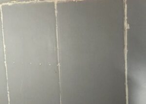 apply the plasterboard panels in two staggered layers and seal the edges